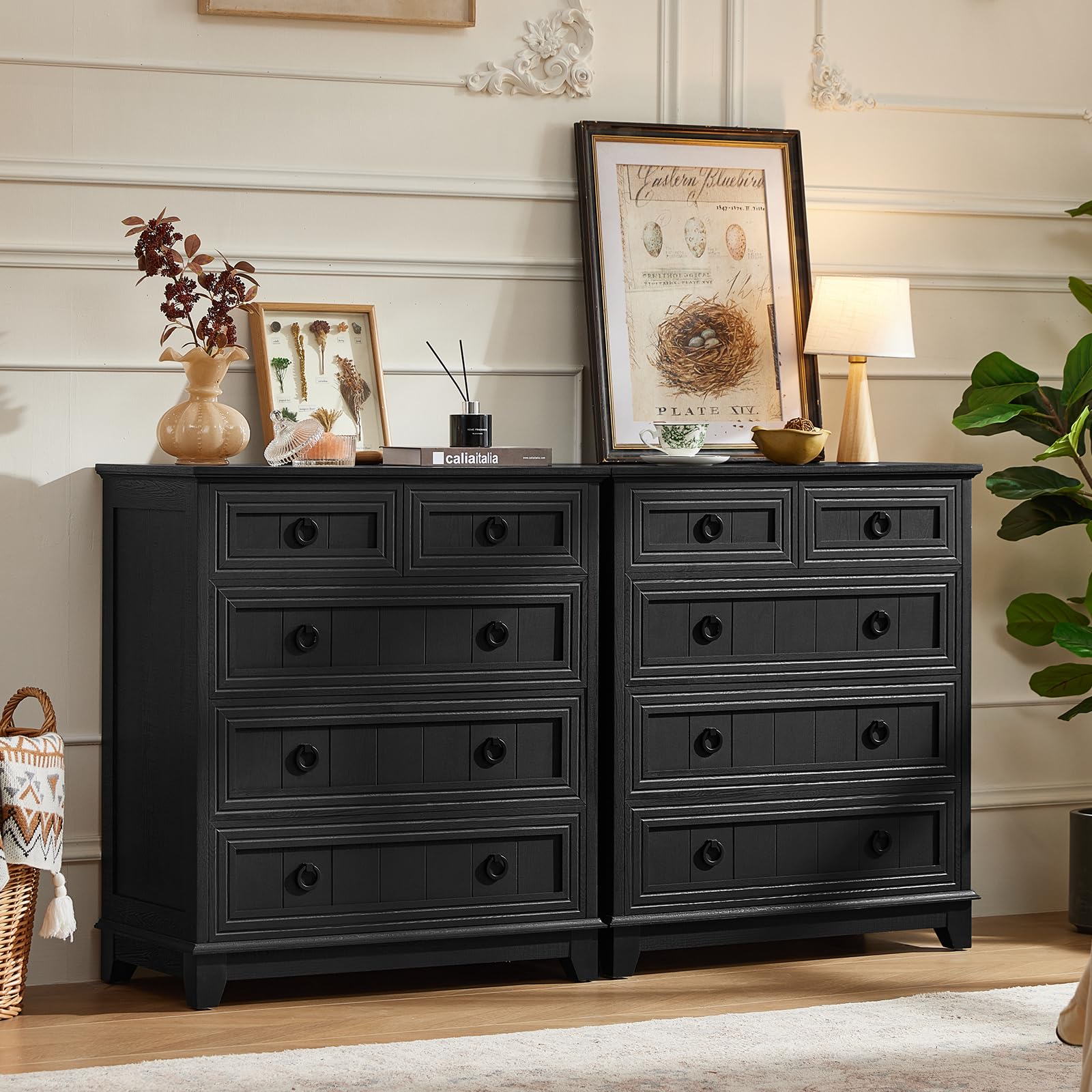 Dark painted wood dresser with five drawers and round metal knobs.
