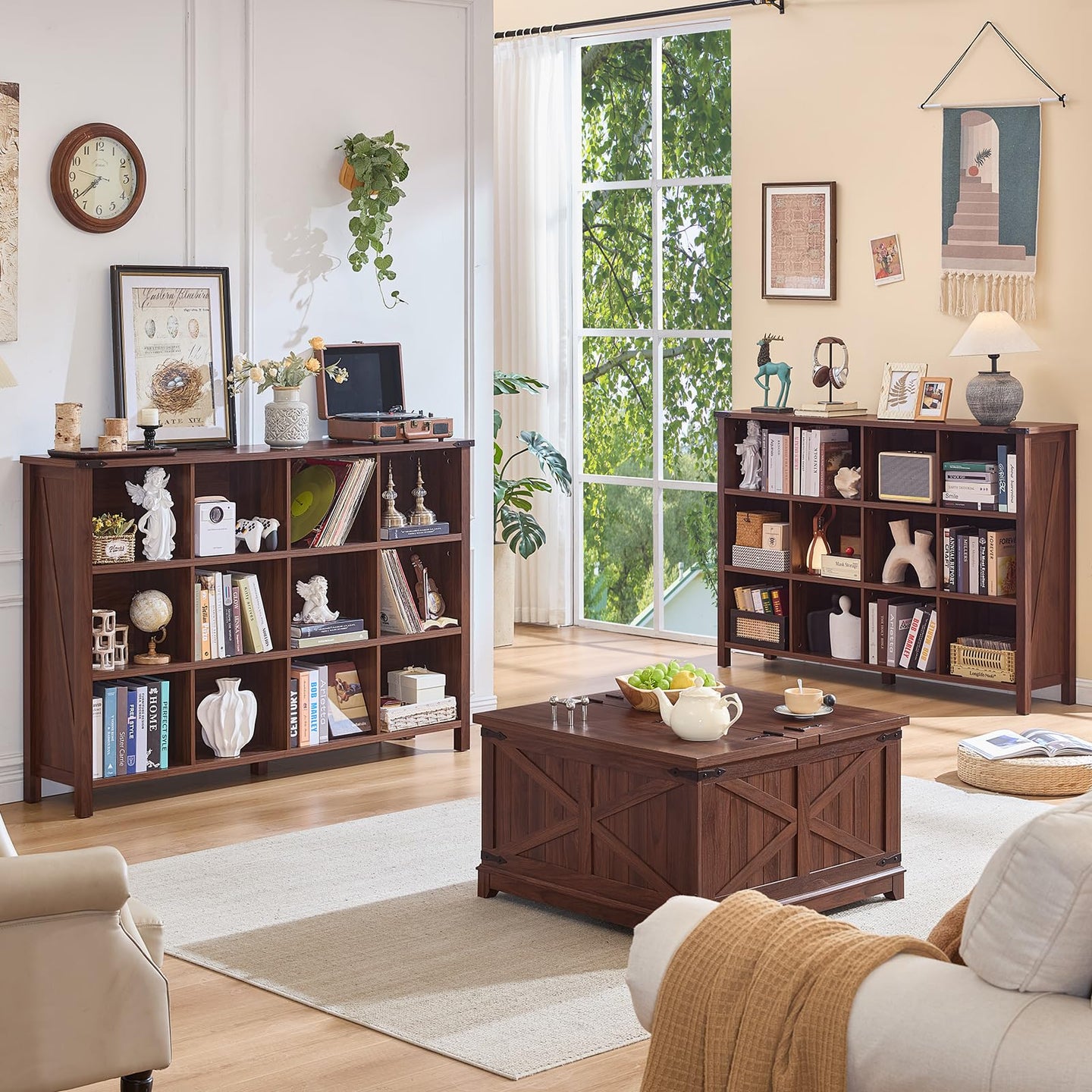 Brown farmhouse bookcase with open compartments and legs, styled with books and decor items
