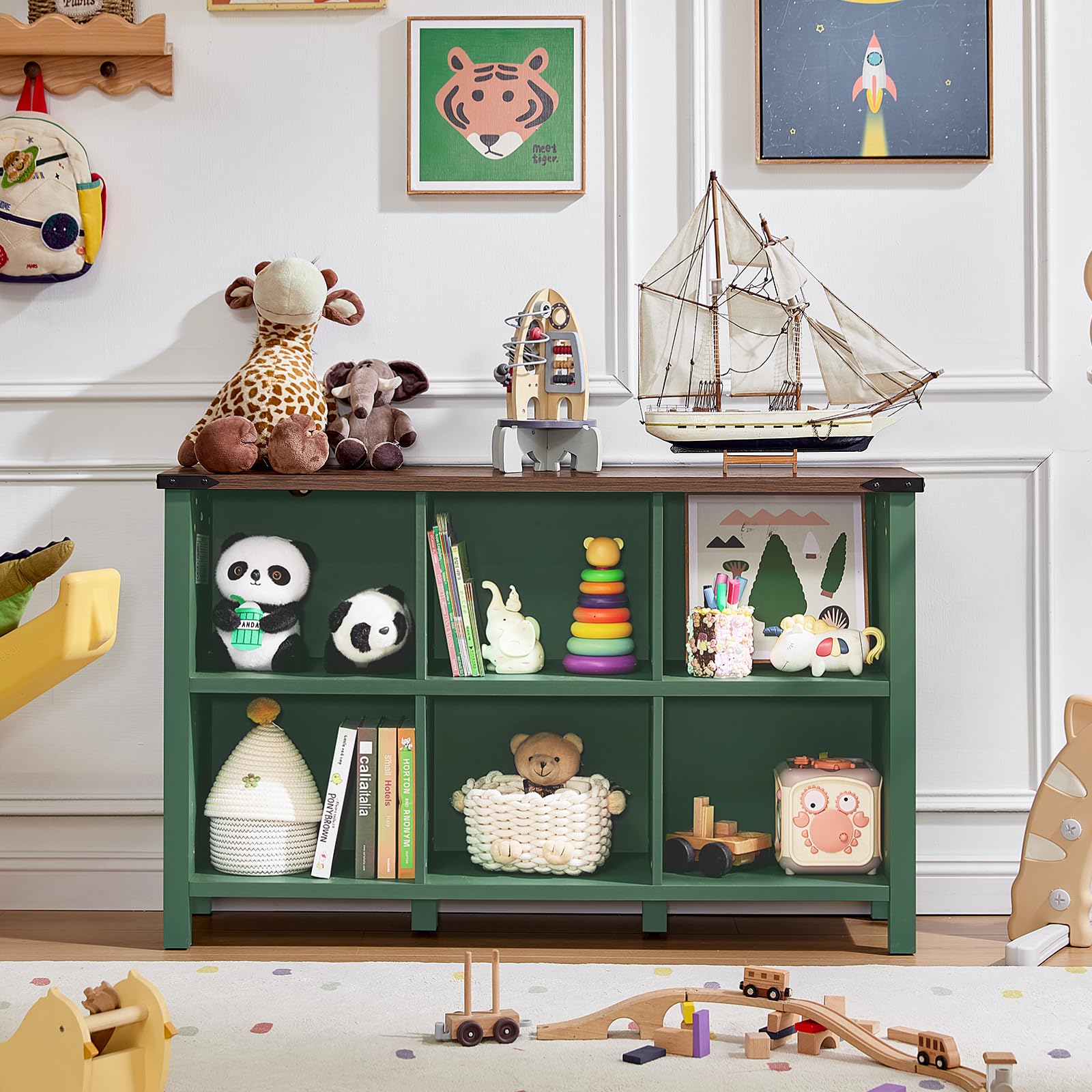 Green low storage bookcase with open compartments, top surface display, and side shelves