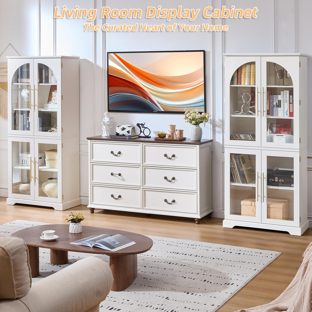 Tall display cabinet in white with 4 curved glass doors and interior shelving compartments