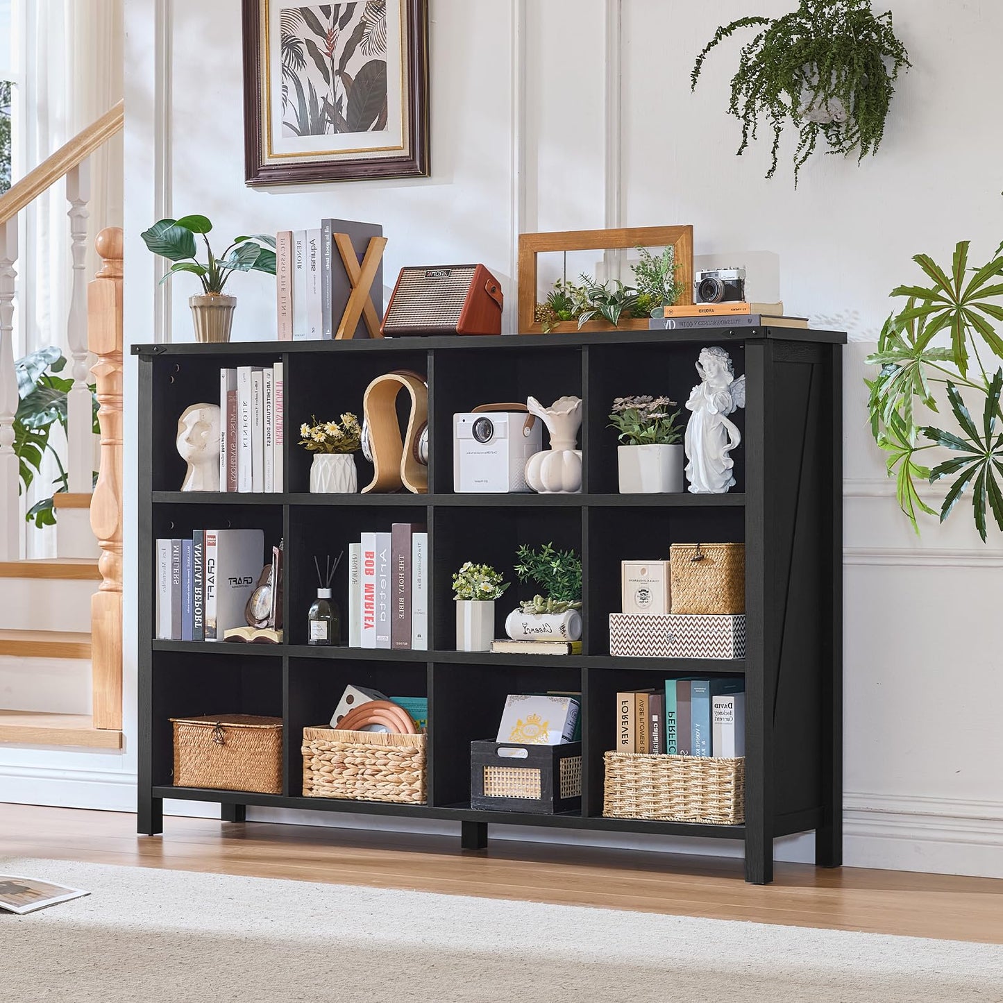 Black farmhouse bookshelf with open cubbies and multiple storage sections on legs