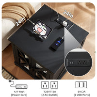 Black coffee table with flip-top surface and built-in charging ports with devices.