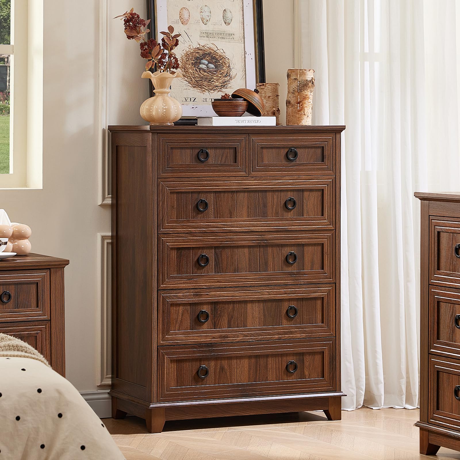 Brown wood farmhouse dresser with five drawers and round metal knobs.
