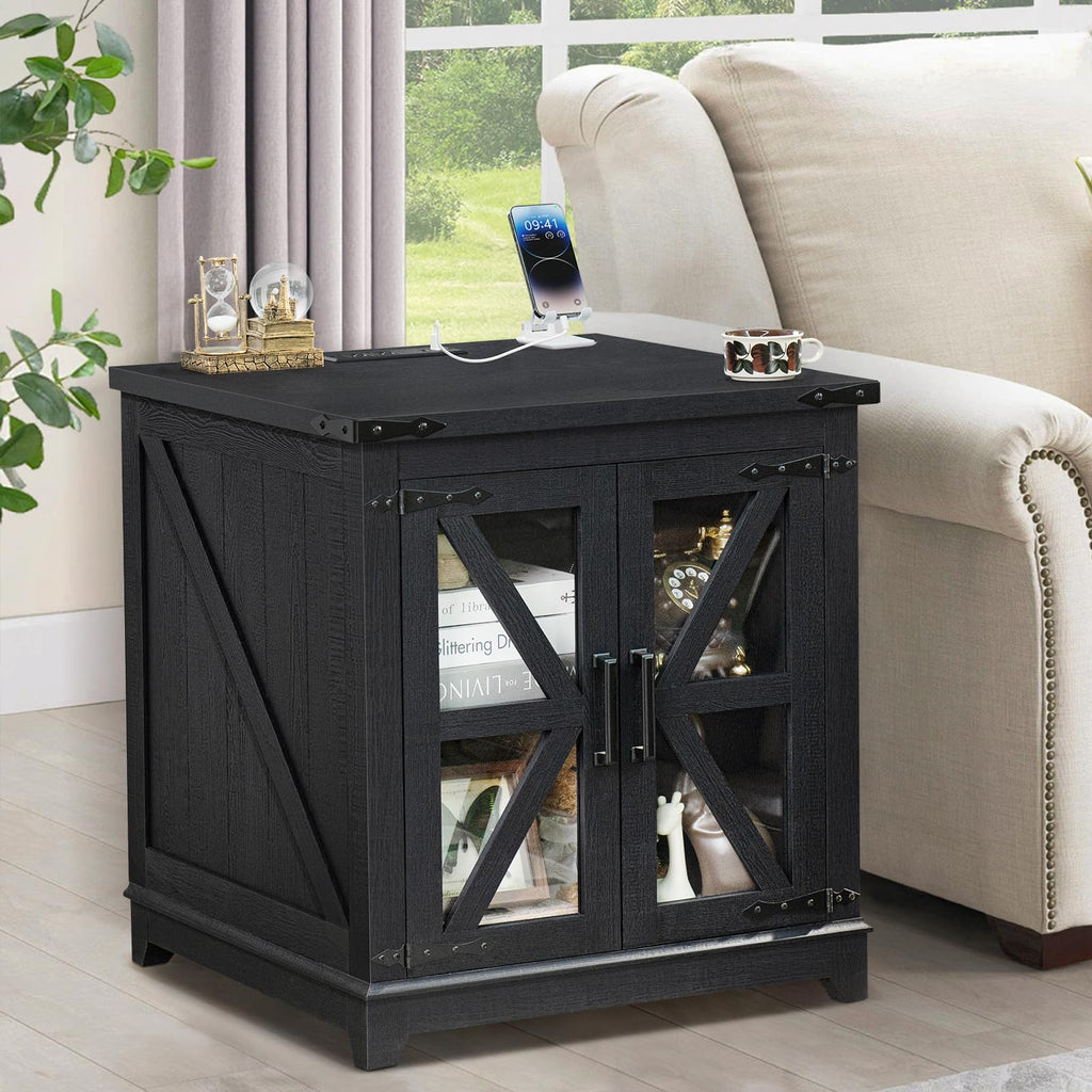 Farmhouse end table with barn-door glass panels and open storage, dark finish.