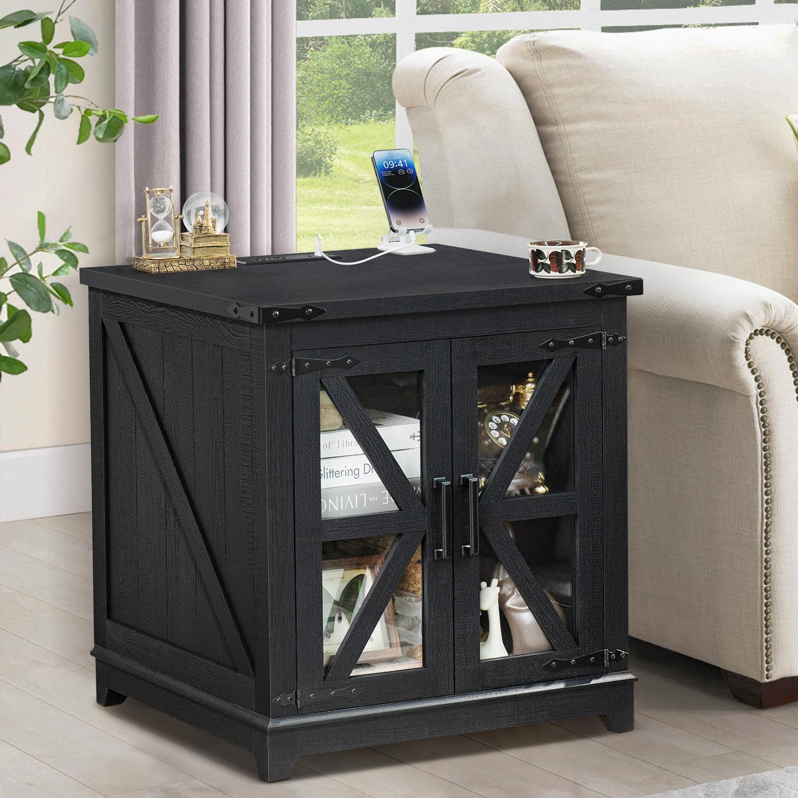 Farmhouse end table with barn-door glass panels and open storage, dark finish.