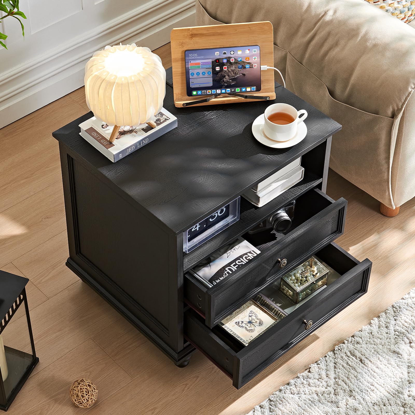 Black 2-drawer dresser with open storage drawer and thick tabletop