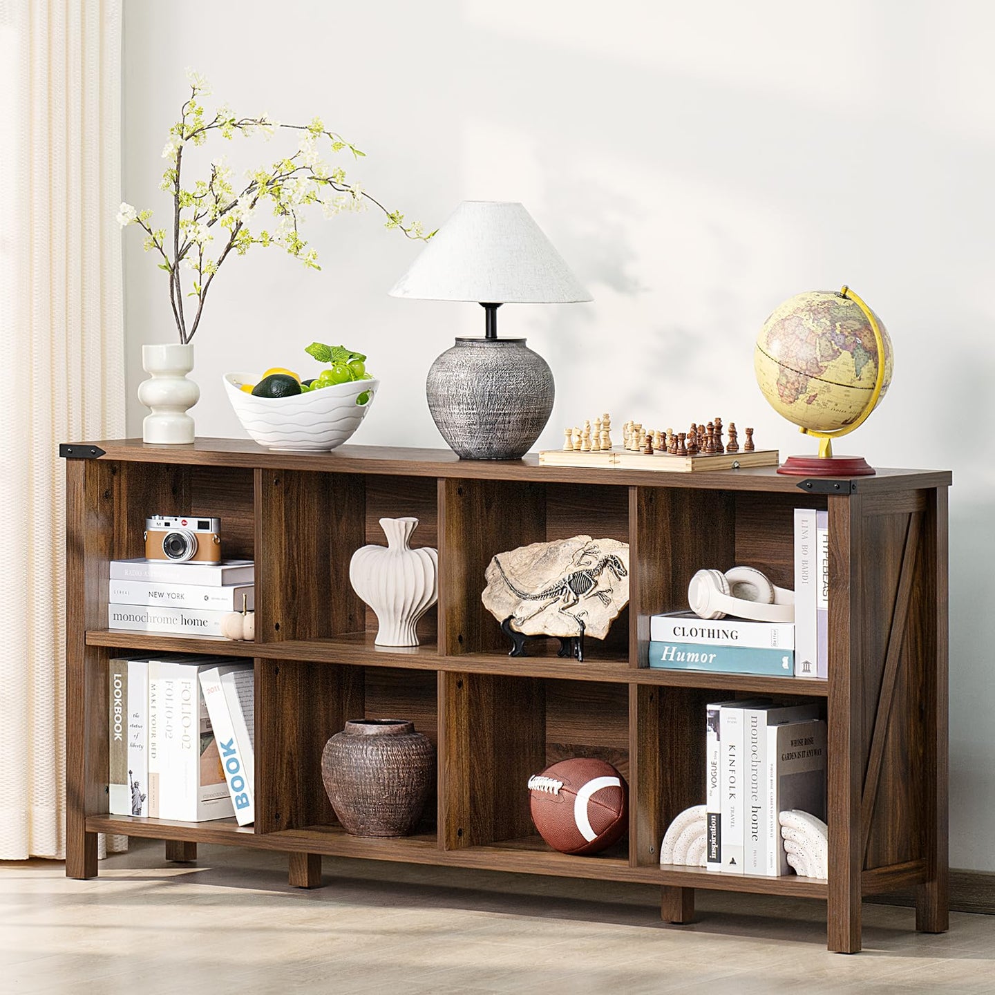 Brown wood farmhouse bookcase with open cubbies, display shelves, and four legs for books and decor