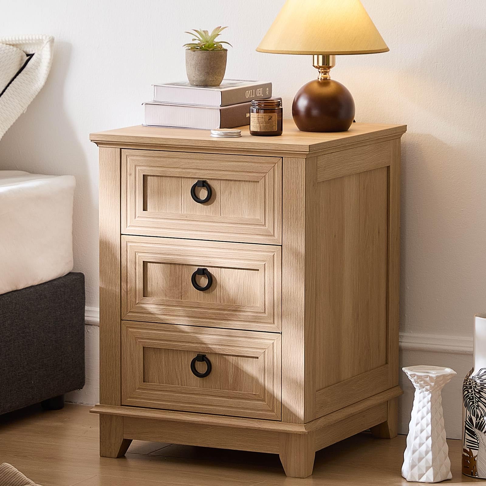 Light wood farmhouse dresser with three drawers and round black metal pulls