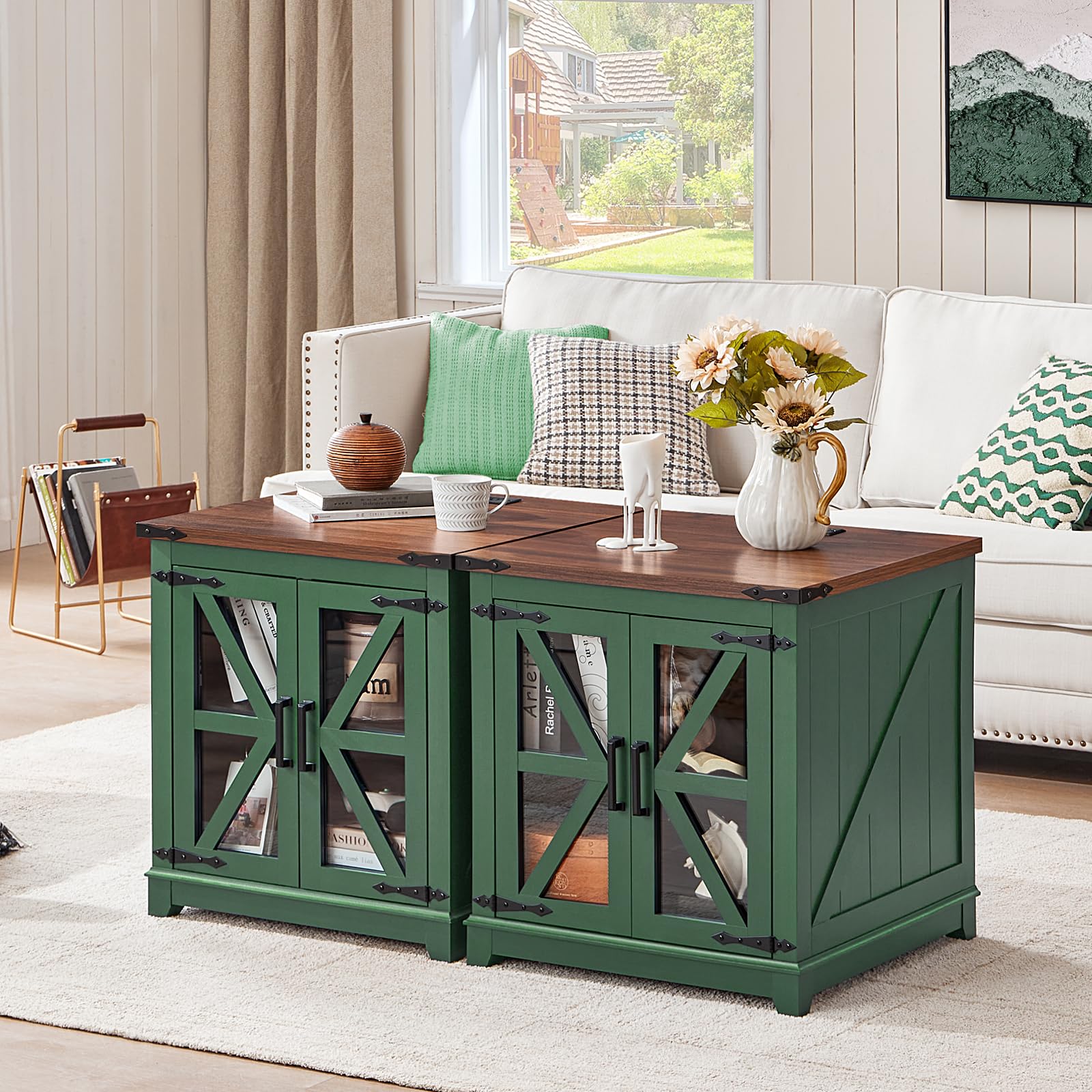 Green farmhouse end table with wood top and glass barn doors, styled with flowers