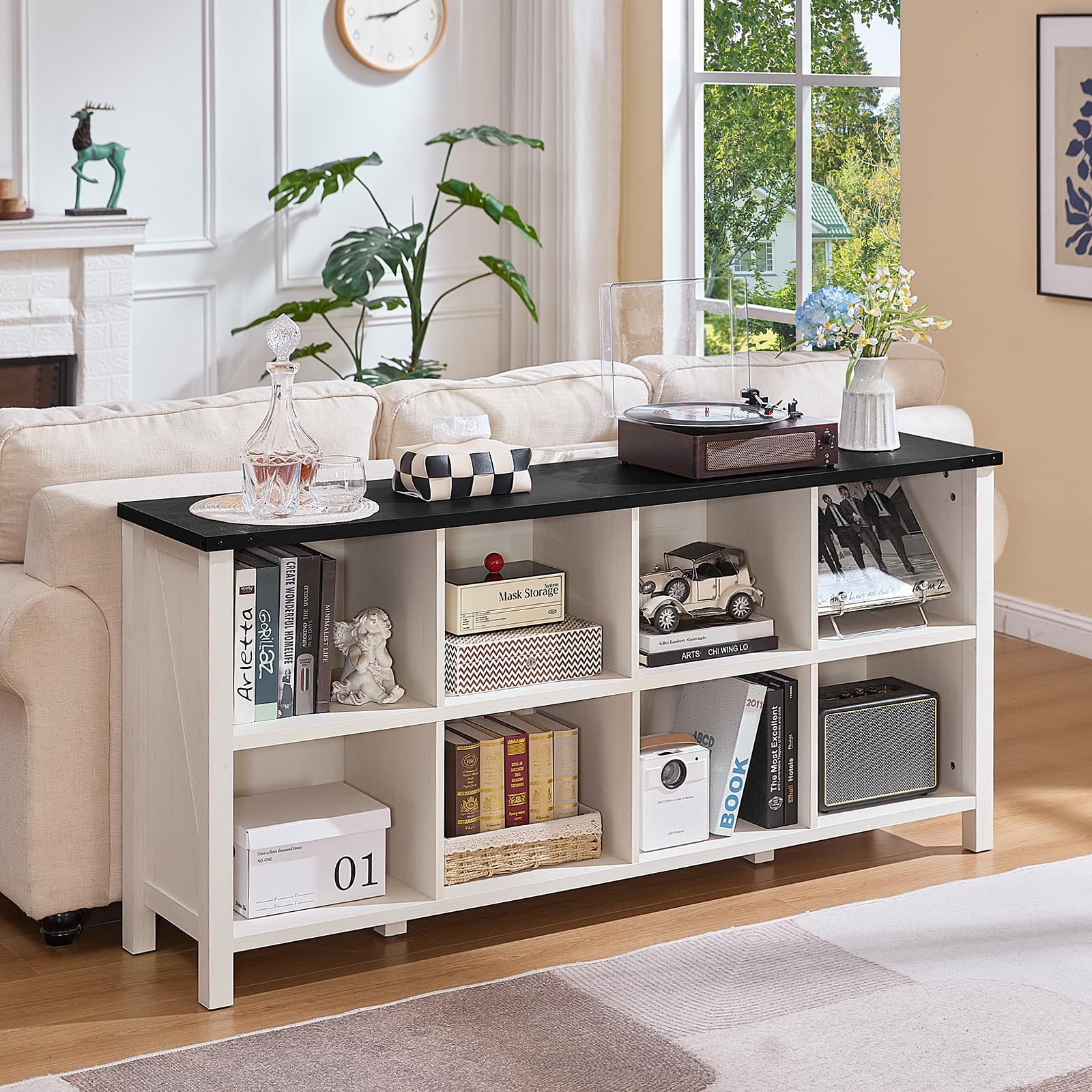 White console bookcase with open cubby shelves and dark tabletop for decor