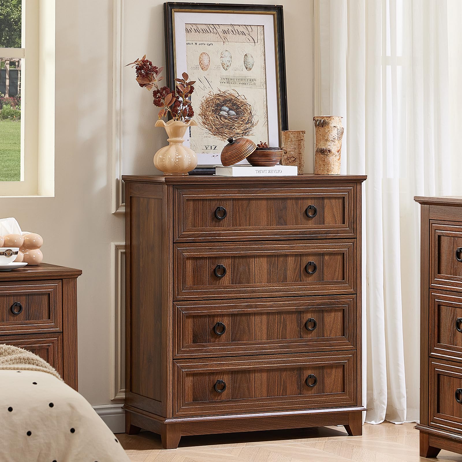 Farmhouse dresser with drawers in medium brown wood finish and round metal knobs.