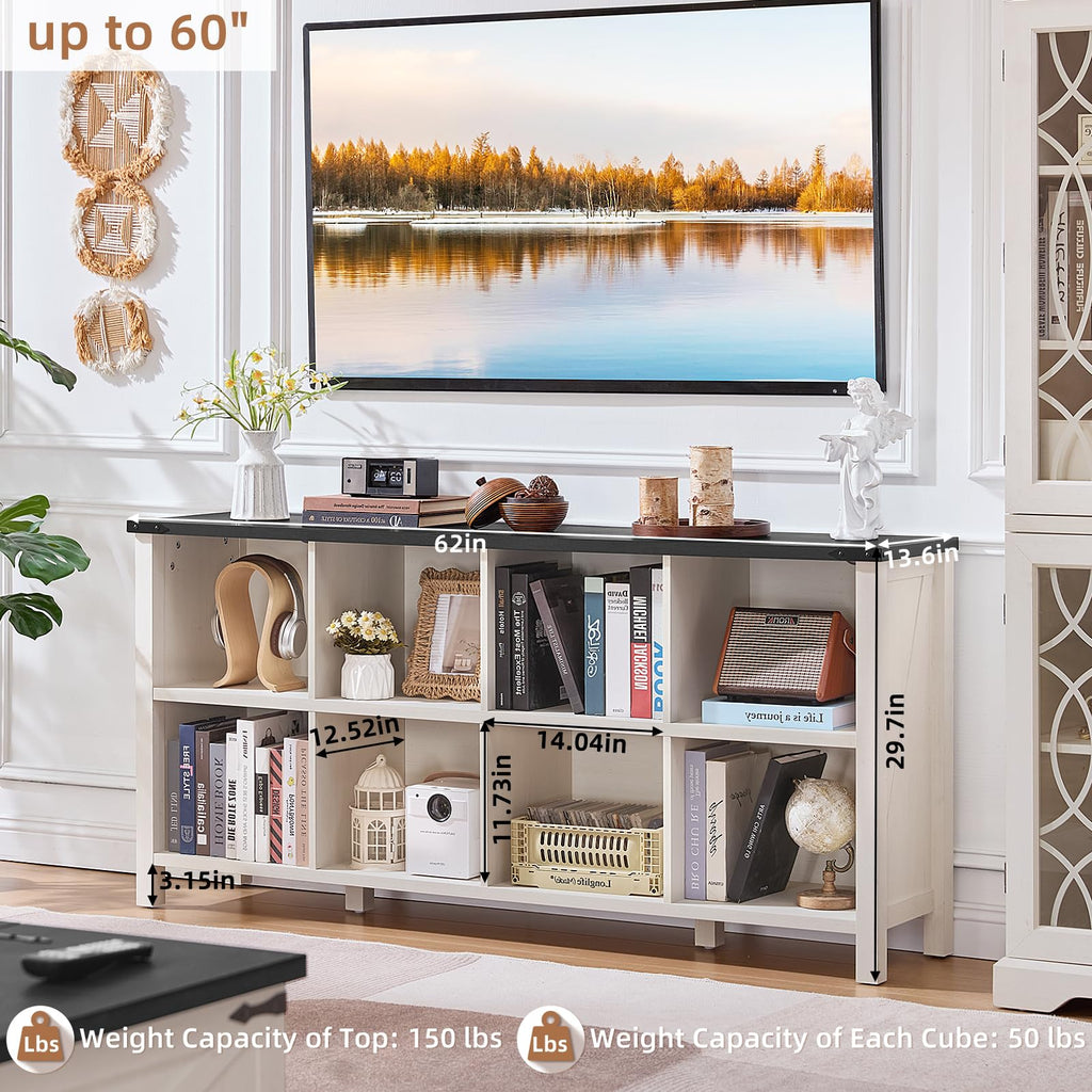 White farmhouse bookcase console with open cubbies and black top panel on legs