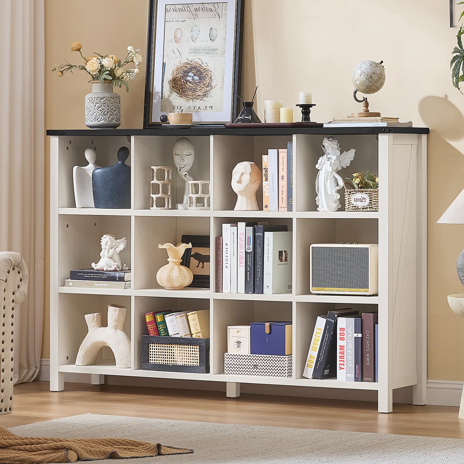 White farmhouse bookcase with open cubbies and thick top, four legs for books and display items