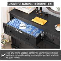 Dark dresser drawer front with black knob pulls and blue storage organizer