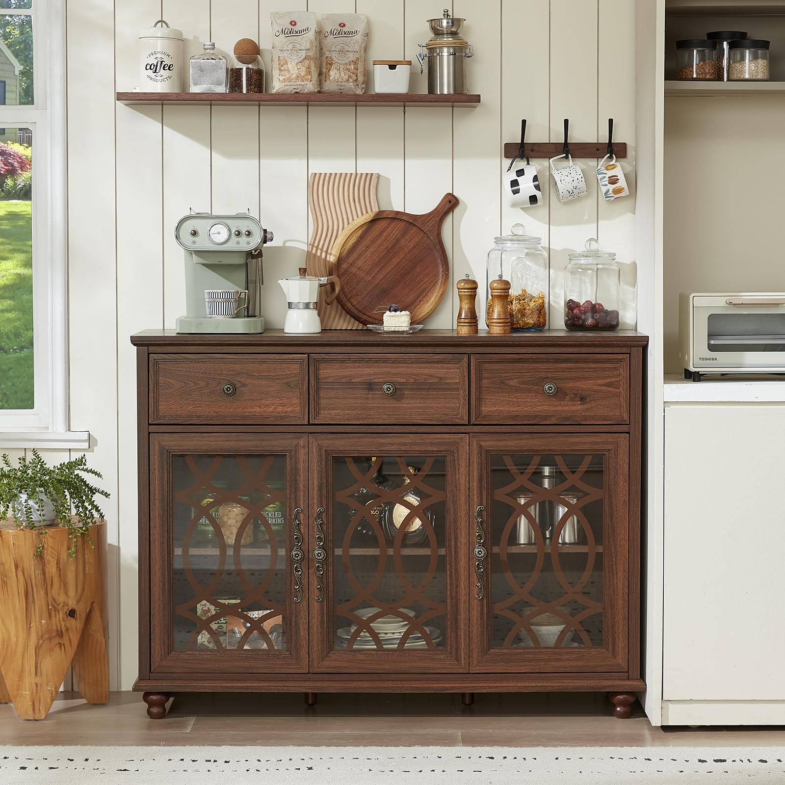 Dark wood sideboard buffet cabinet with three glass doors and three drawer fronts