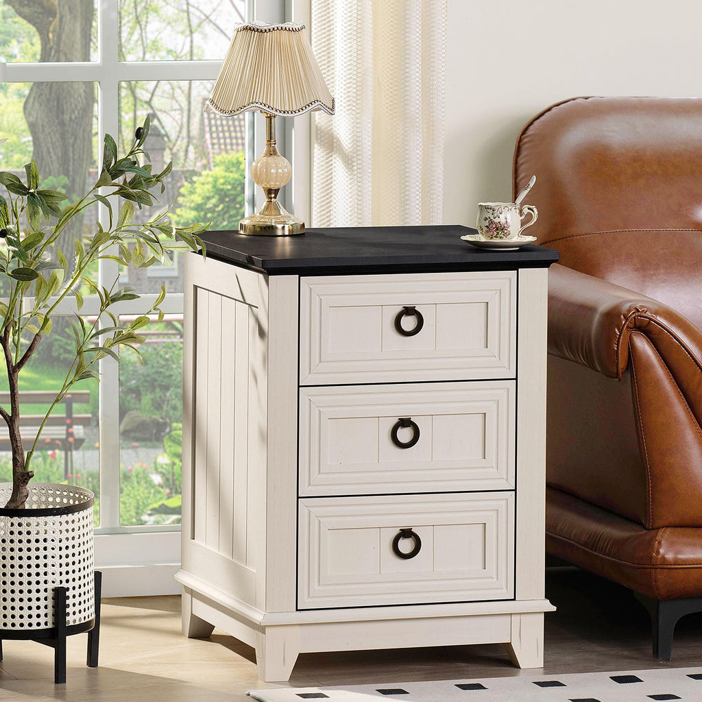 White farmhouse nightstand end table with three drawers, country style beside couch