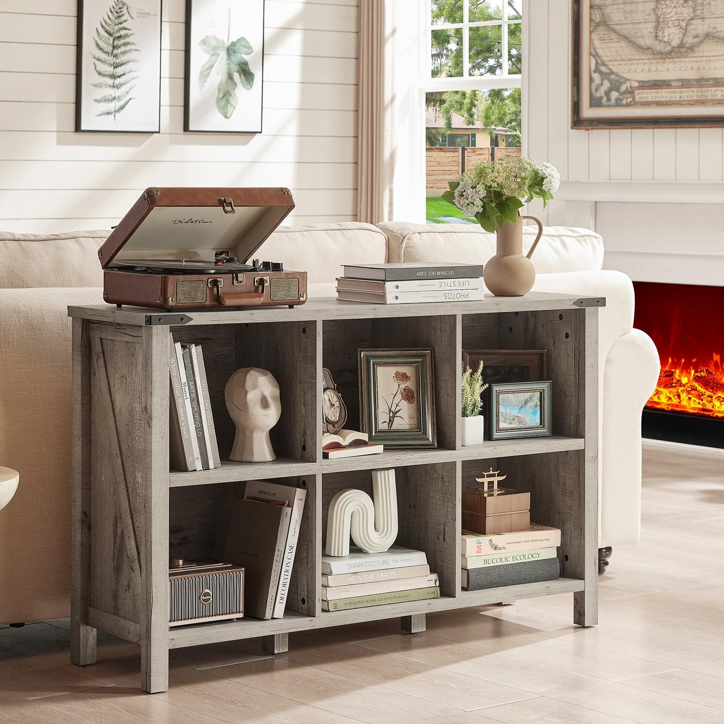 Dark brown wood bookcase with open cubbies and farmhouse legs