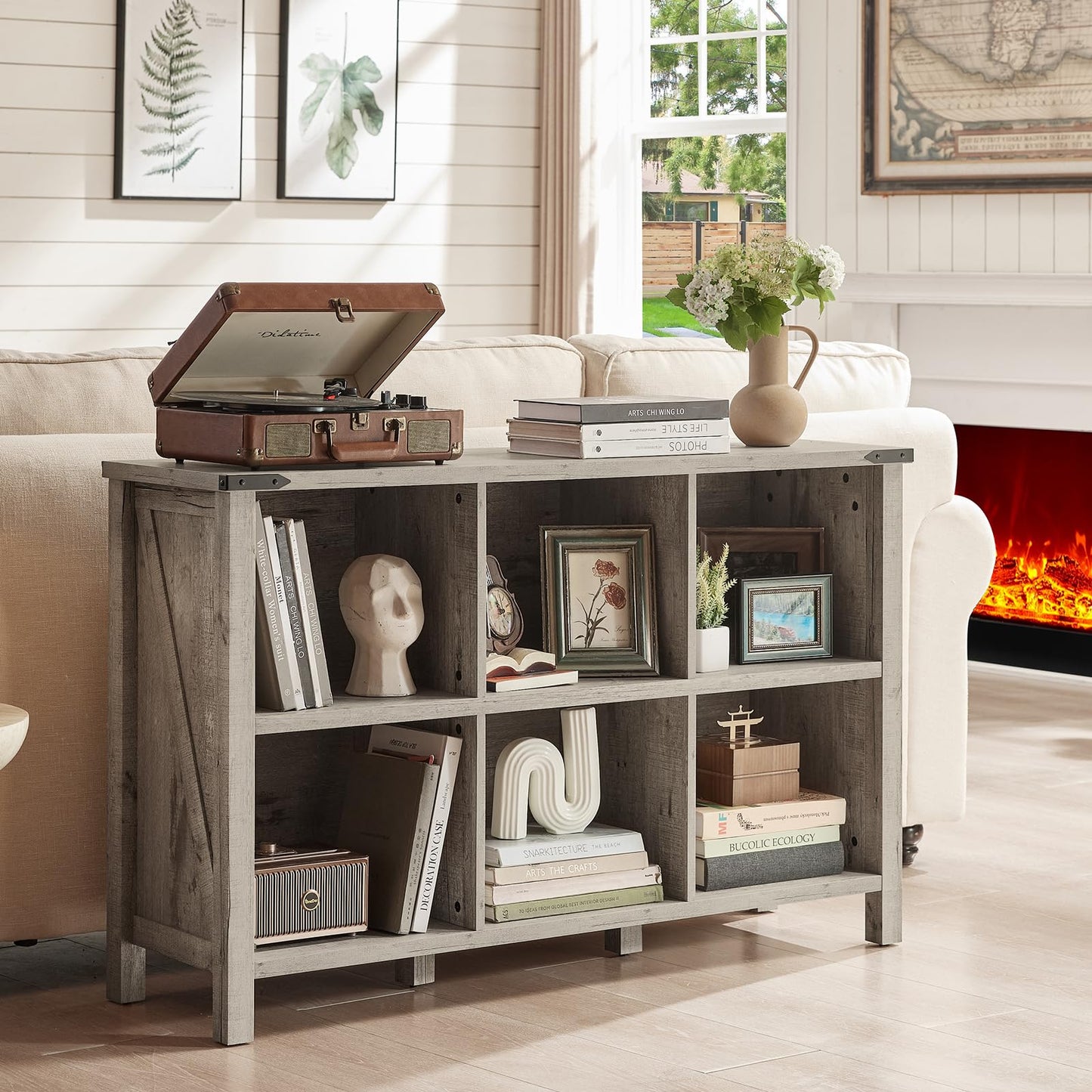 Dark brown wood bookcase with open cubbies and farmhouse legs