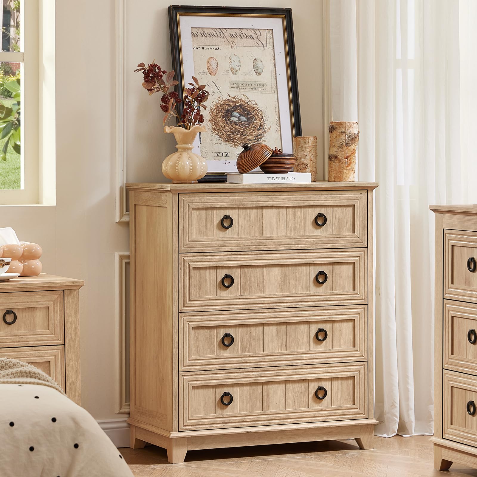 Farmhouse dresser with drawers in light natural wood finish, featuring round metal knobs.