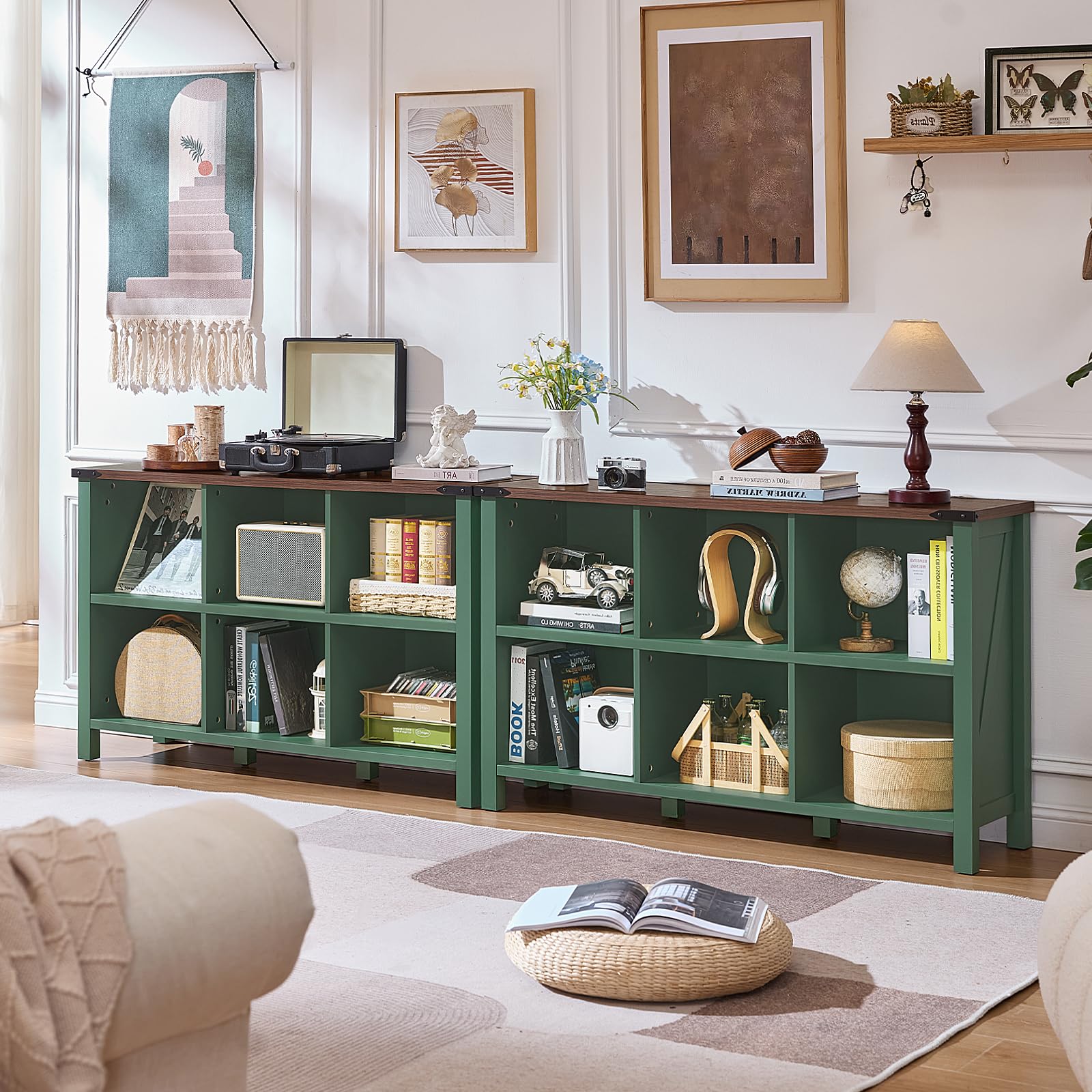 Green console bookcase with multiple open cubby shelves and tabletop for display