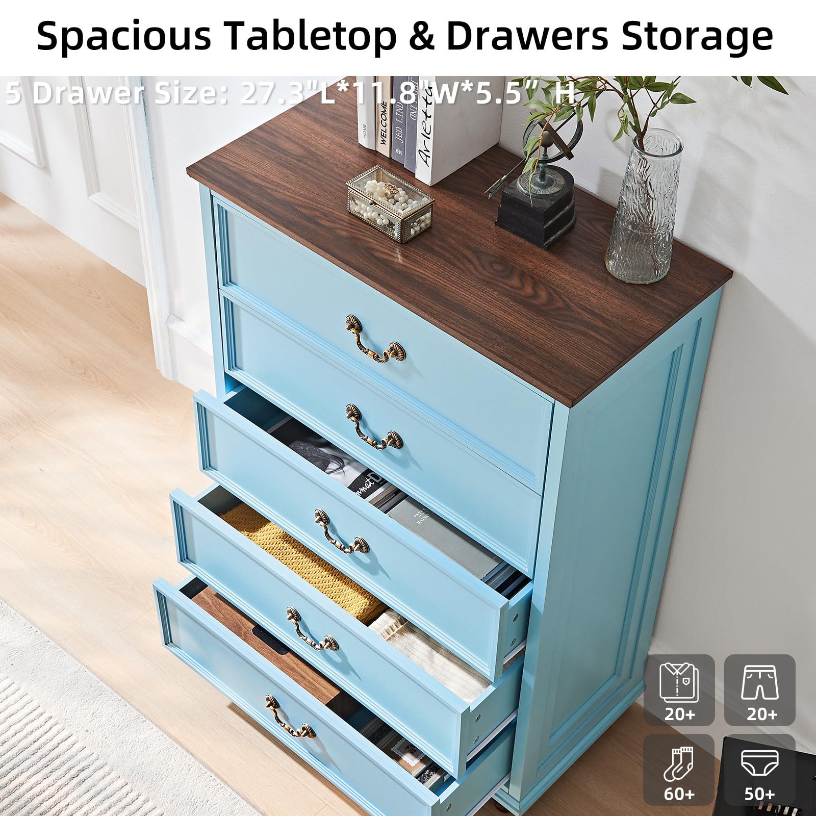 Light blue dresser with dark wood top, open drawers, and brass drawer pulls