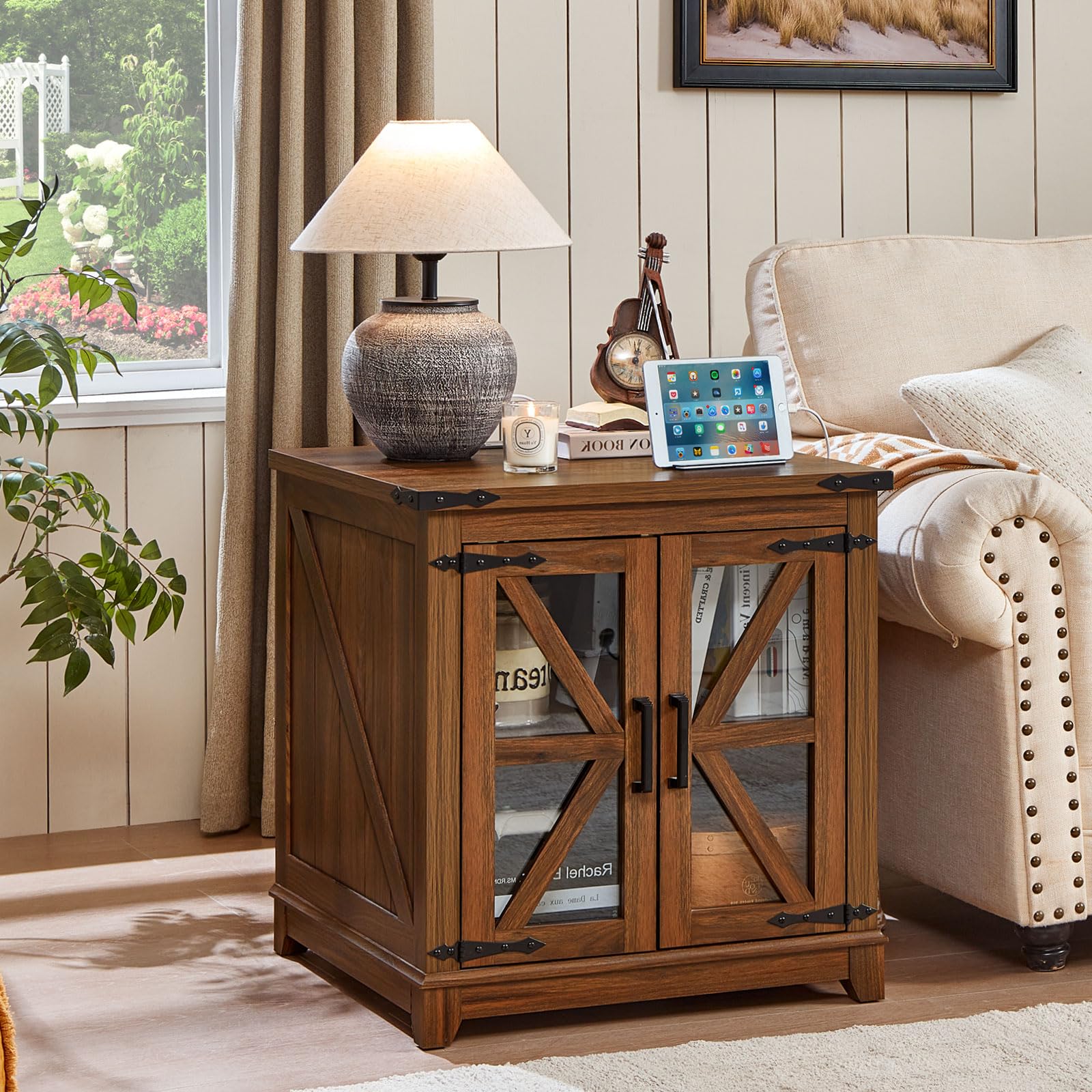 Farmhouse end table with brown cabinet doors and glass panels, wood top beside sofa