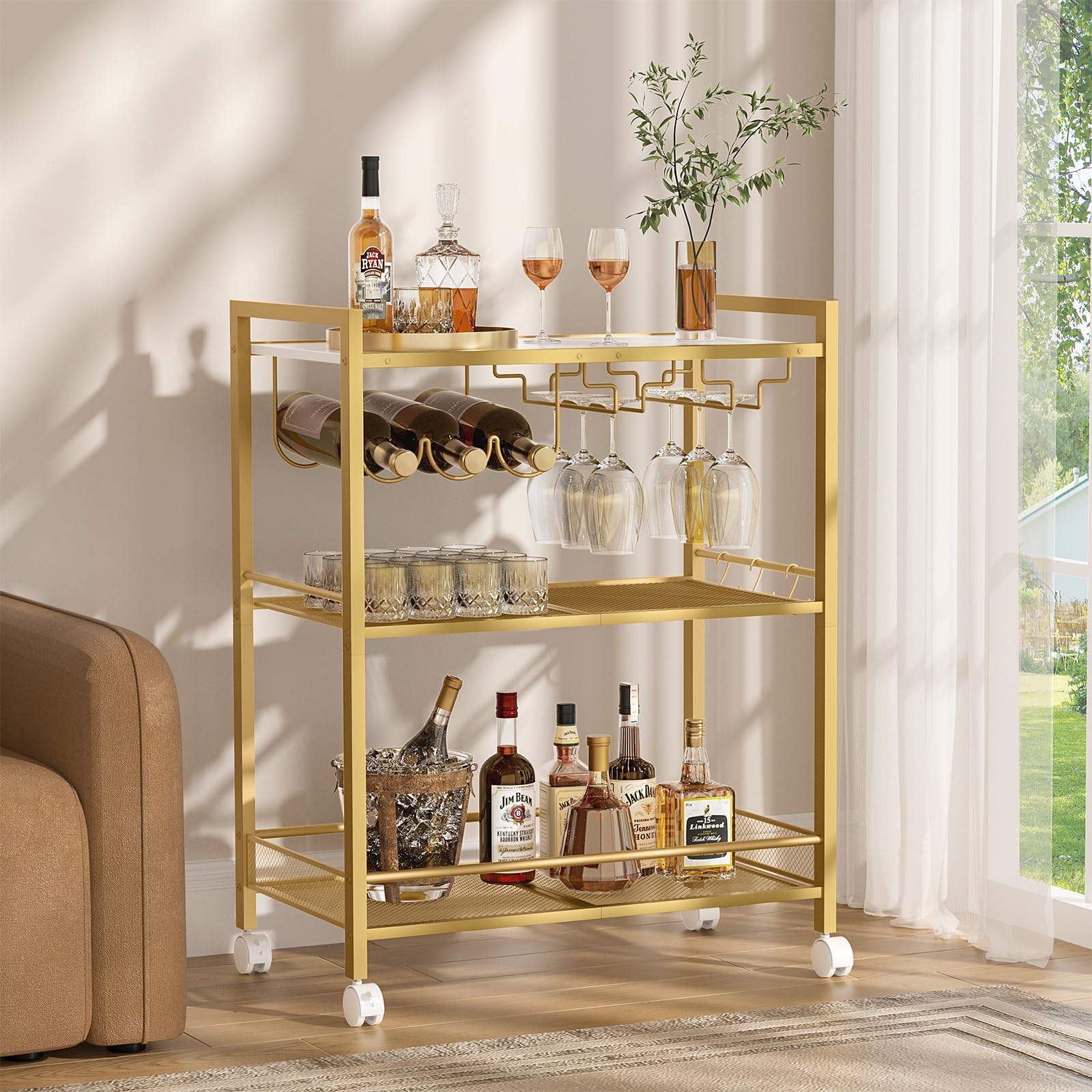 Gold bar cart with bottle rack and glass holders on 3-tier shelves with caster base
