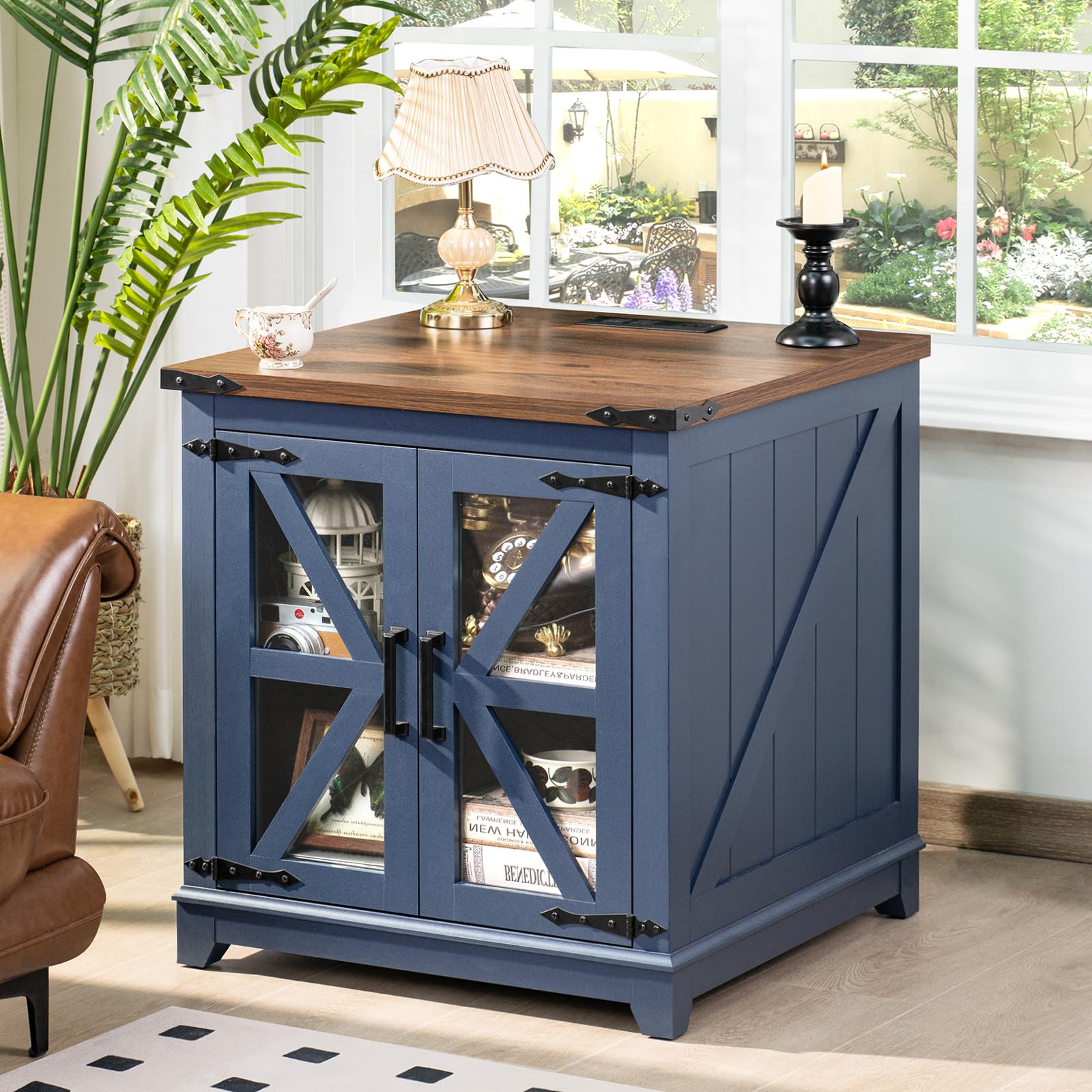Farmhouse end table with wood top and blue cabinet doors with glass panels and X accents