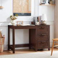Dark walnut executive desk with three drawers and spacious open workspace