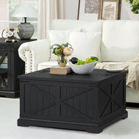 Black farmhouse coffee table with flip-top lid and hidden storage