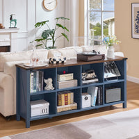 Blue console bookcase with open storage shelves and side compartments on legs