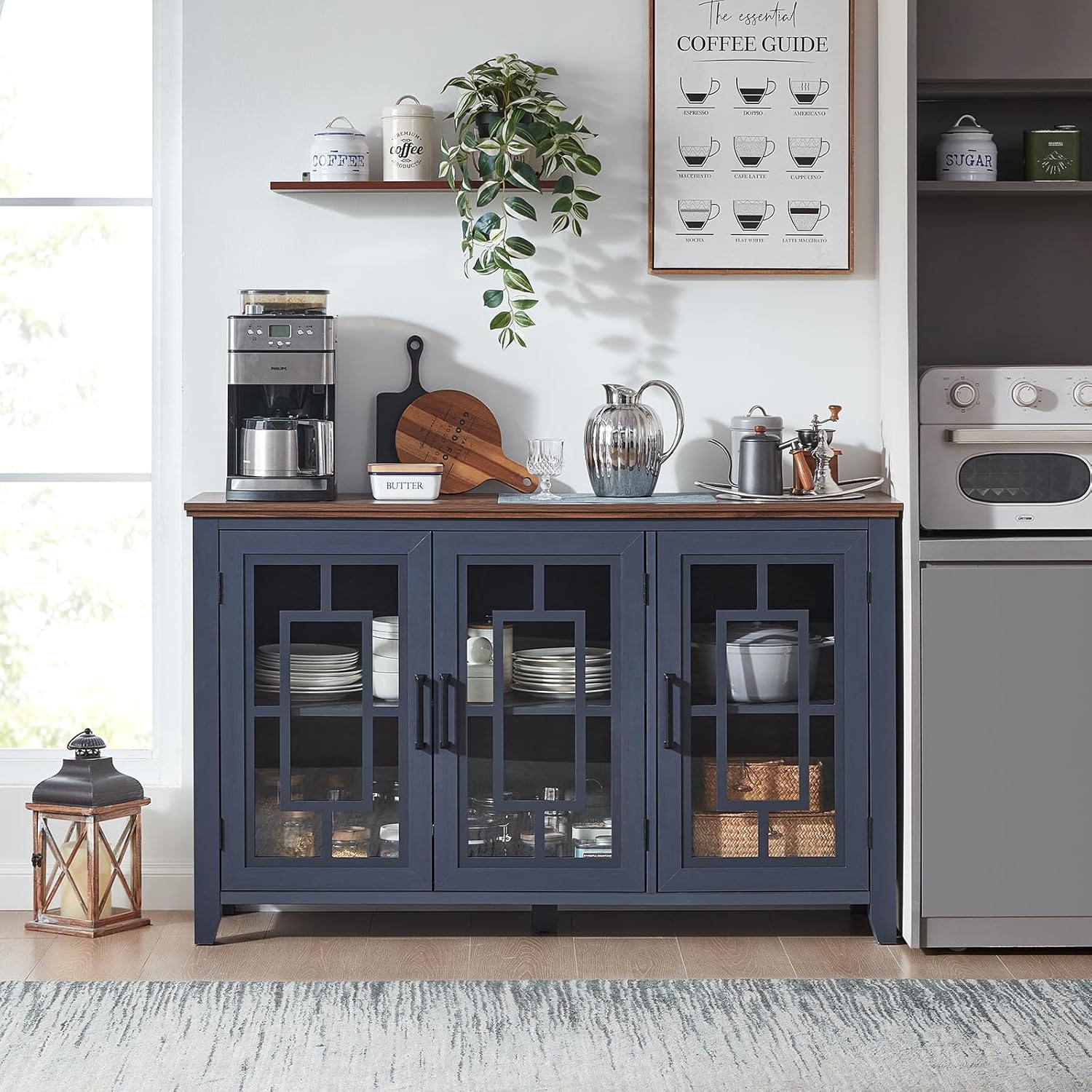 Navy sideboard buffet cabinet with three glass doors and a wooden serving top