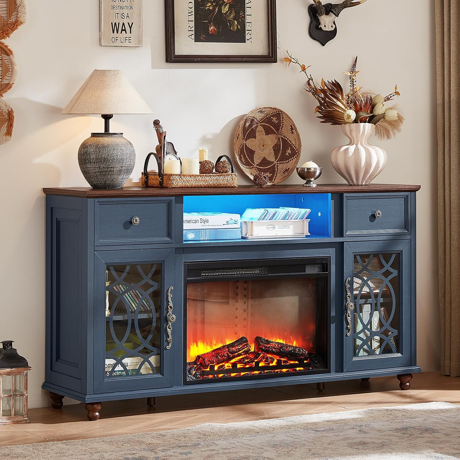 Blue farmhouse TV stand with electric fireplace and glass cabinet doors