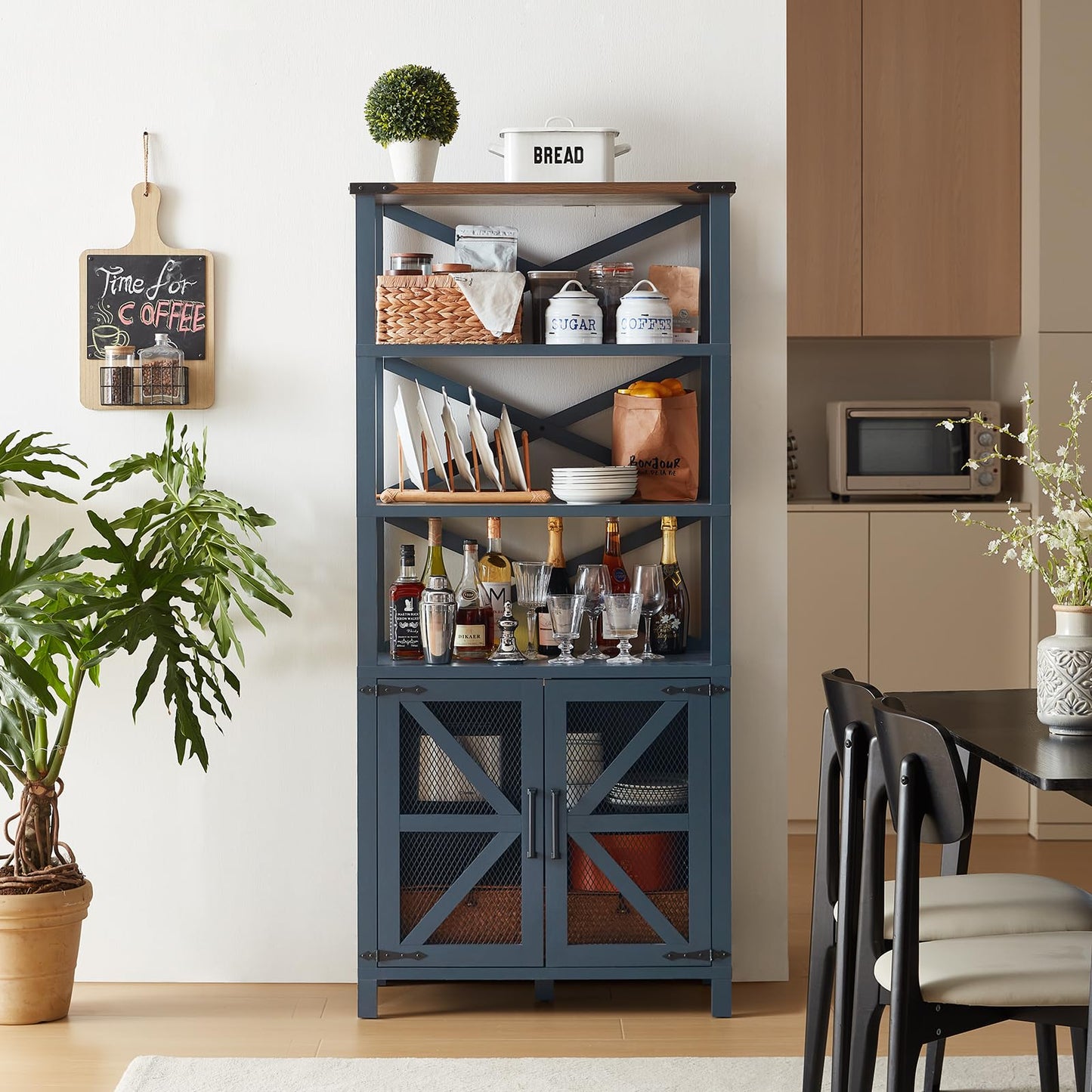 Blue storage bookcase with open shelving and two mesh barn doors with X accents