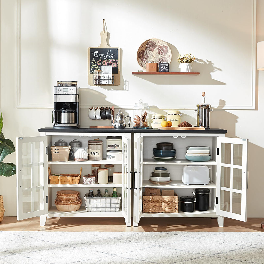 White buffet cabinet with black top, open shelves, and glass-door storage compartments