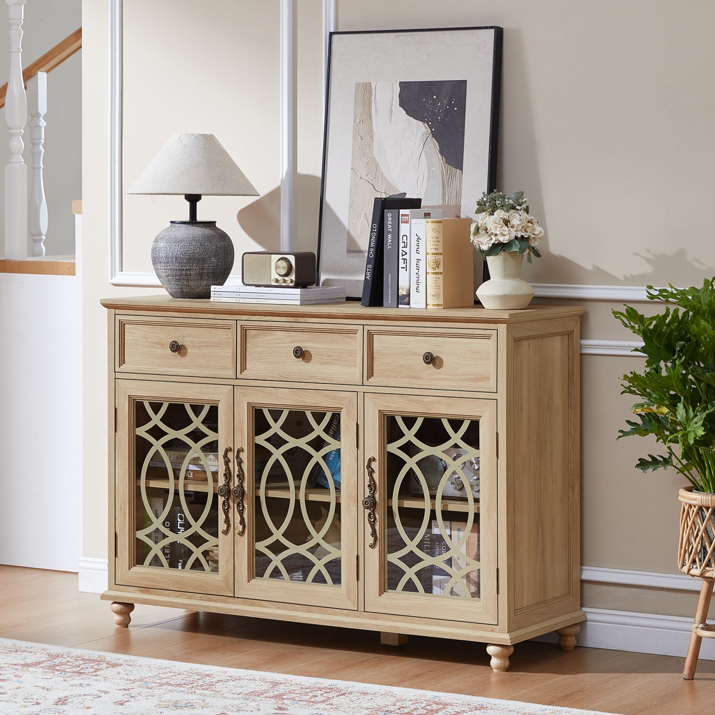 Light wood sideboard cabinet with drawers and arched glass door panels